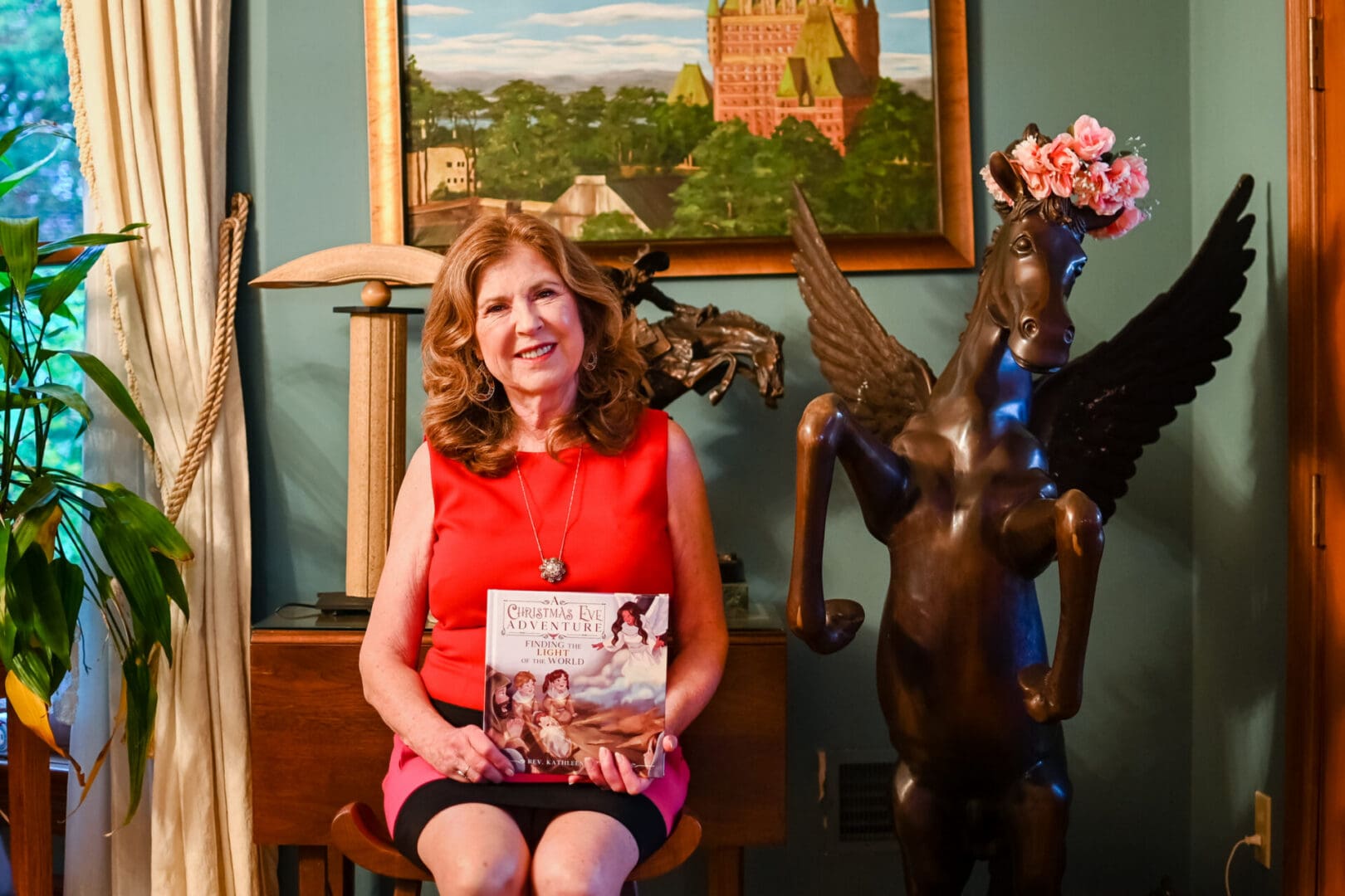 Woman holding a children book about Christmas